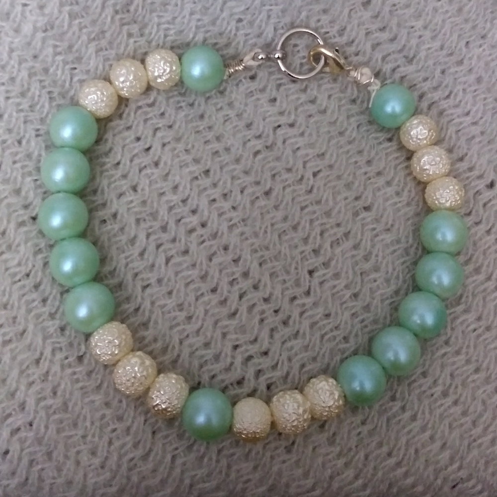 Light blue and white child's bracelet